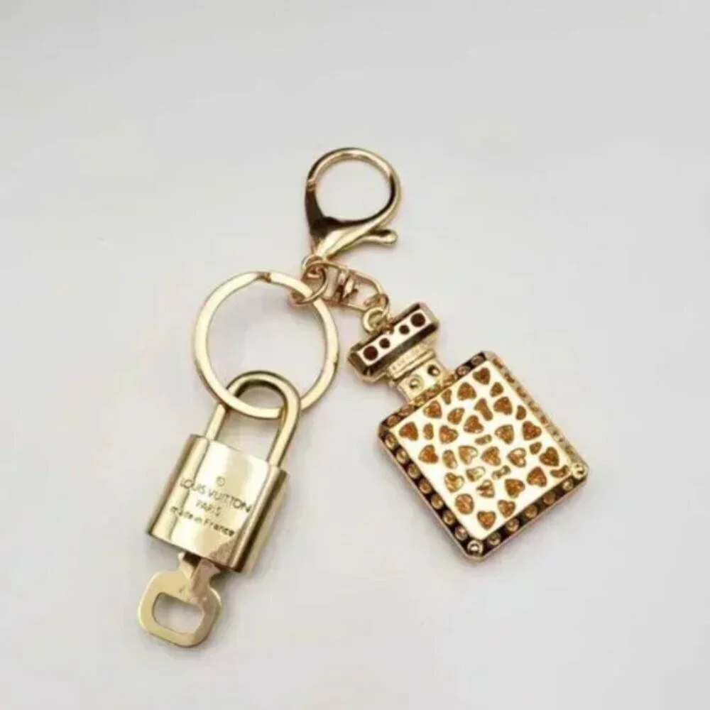 LV Authentic Gold Padlock 🔒 Key Set w/ Unbranded N5 Bottle Keychain Charm